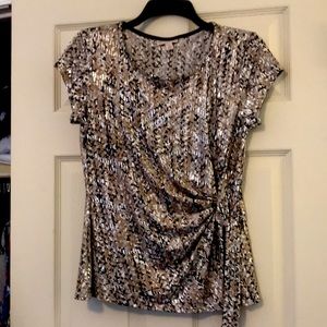 Polyester and spandex blingy top, never been worn